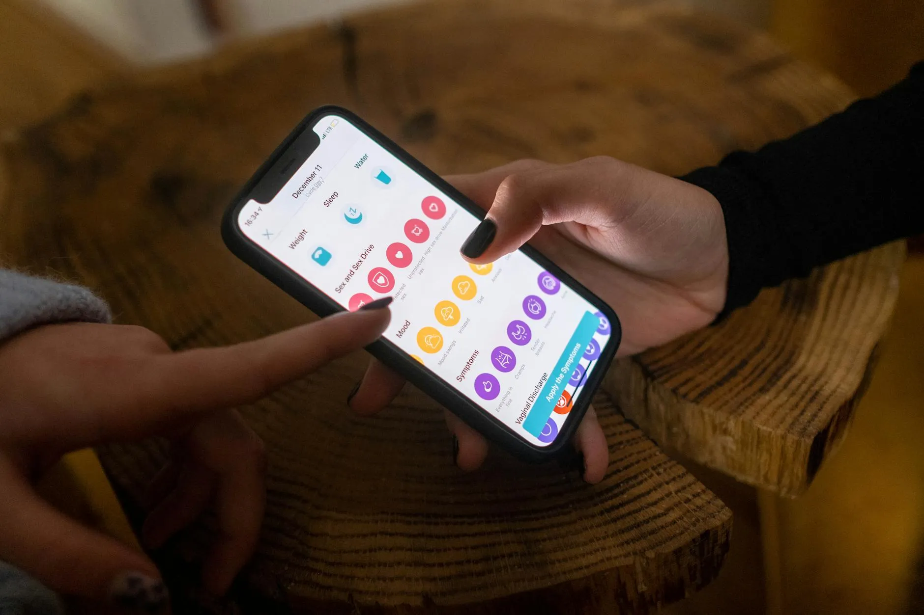 Person using a mental health app on their phone
